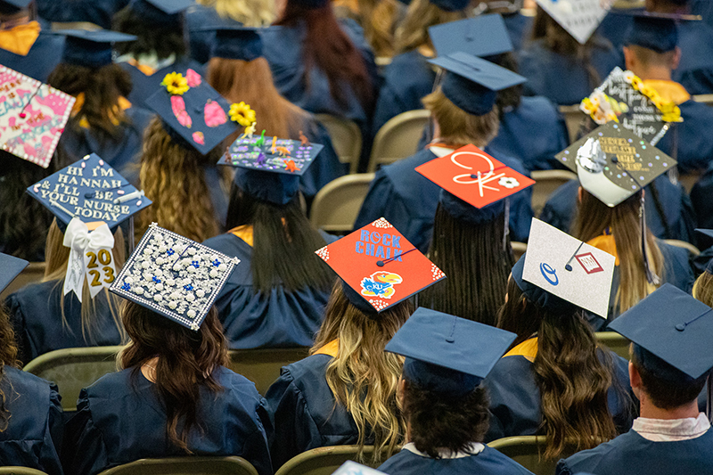 Image of decorated graduation caps at Otero College
