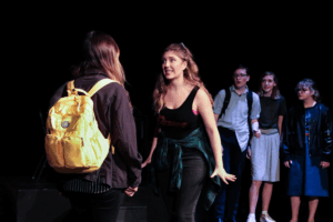 High school girls face eachother